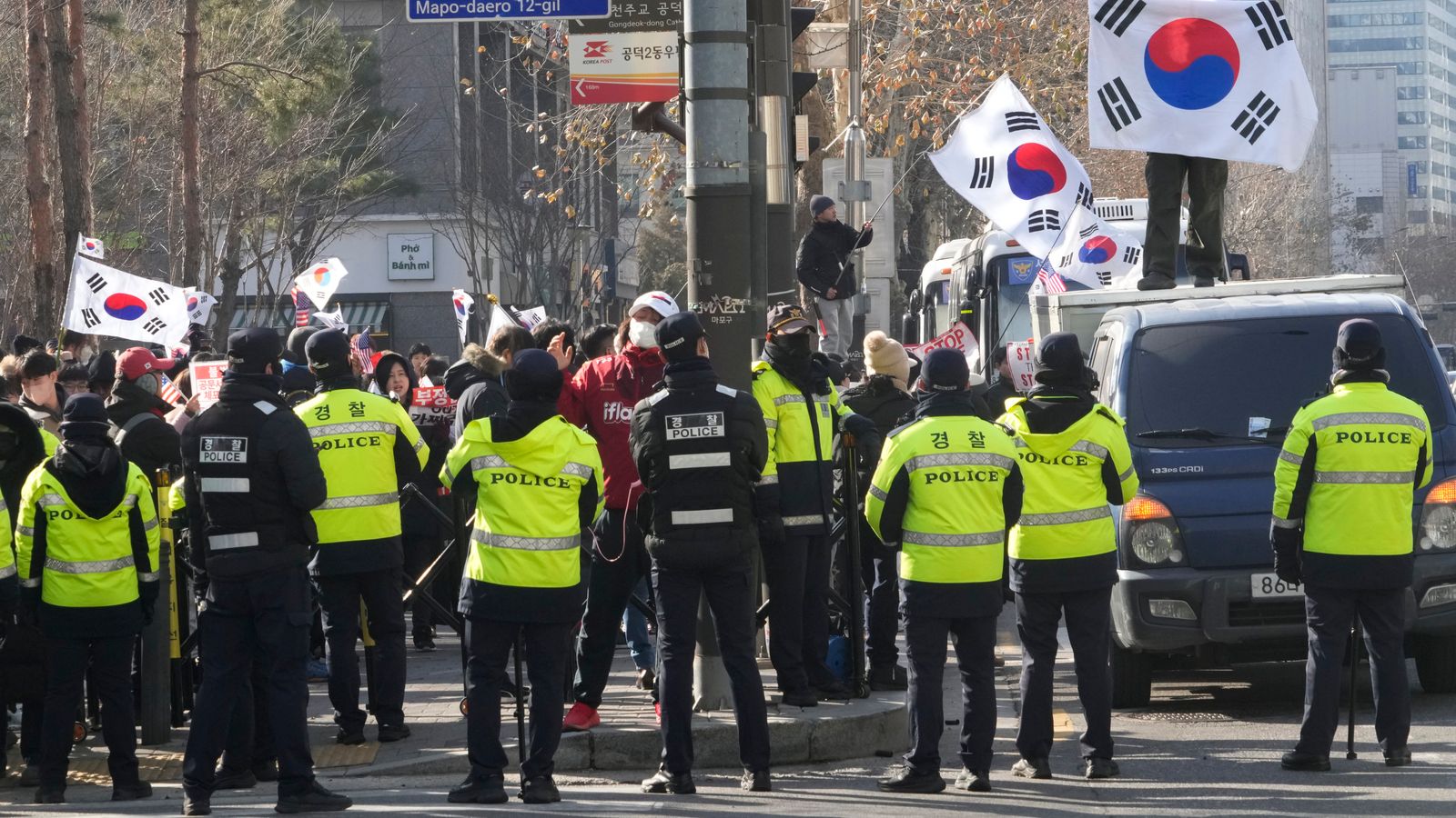 South Korea president to appear at hearing as thousands of supporters gather near court | World News